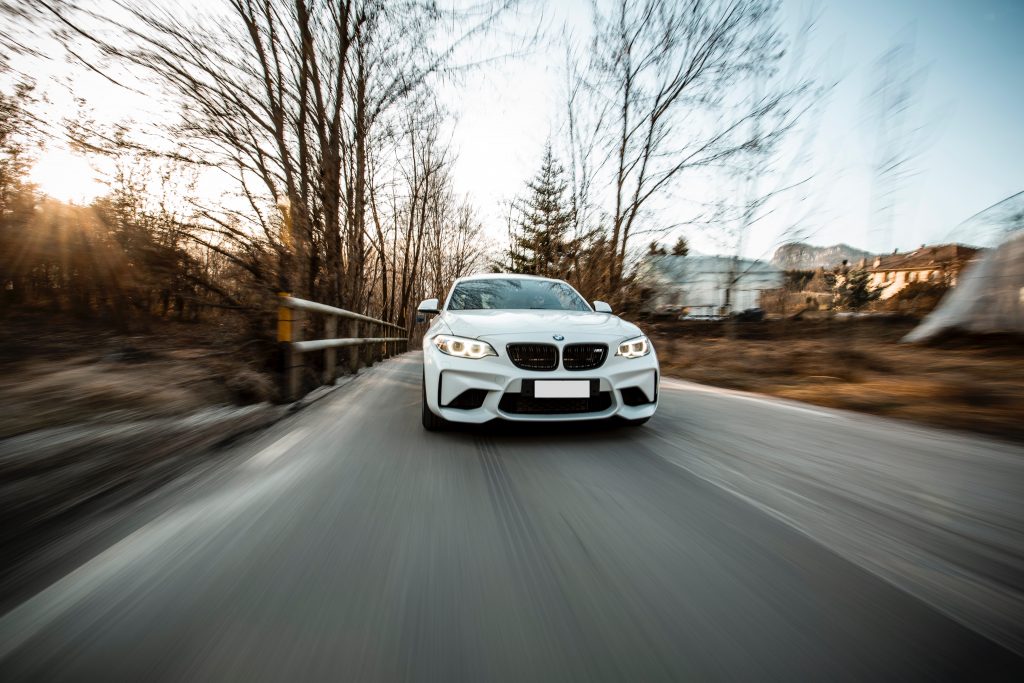 matteo-balzanelli-N9PD7DvxFQA-unsplash White BMW Driving