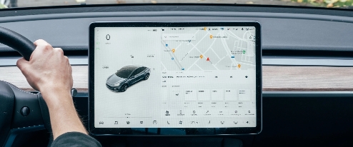 jonas-leupe-pDOM_D1GEwk-unsplash Tablet inside a car